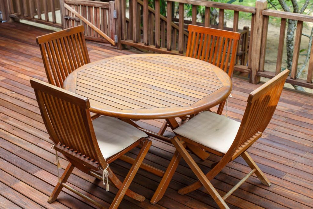 Wooden outdoor table with wooden outdoor chairs